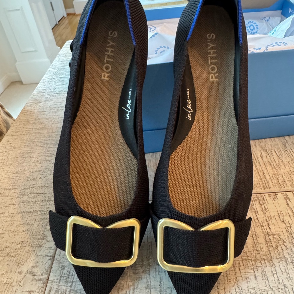 Rothy's Black and Gold Flats with Chic Buckle